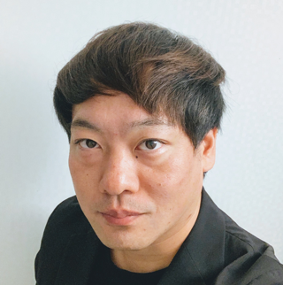吉田 泰己氏 写真